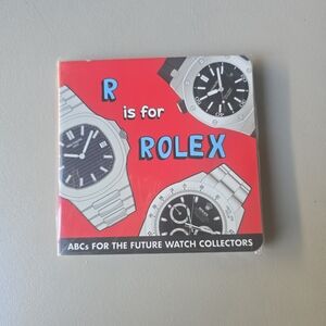 Rolex Children's Board Book in Bright Red with Blue Accents